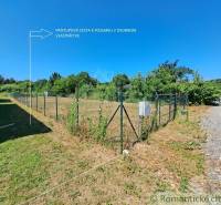 A plot of land for residential use in Hosťová with a private access road.