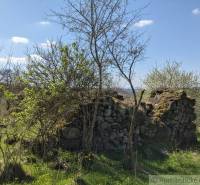 A rocky ruin surrounded by nature, ideal for residential land in Krupina.