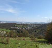 Landscape with a view of the village and surrounding nature in Krupina for residential land.