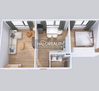 Floor plan of a 2-room apartment with wood-patterned flooring, work and living space.