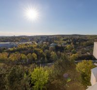 View from a 2-room apartment in Bratislava - Staré Mesto with a panorama of the city and greenery.