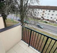 The view from the balcony above Svätoplukova Street in Prievidza captures the surroundings of a 2-room apartment.