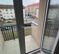 Balcony door in a 2-room apartment with a view of Svätoplukova Street in Prievidza.