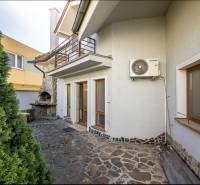 A family house on Podpriehradná Street in Bratislava-Vrakuňa, spacious terrace with a fireplace.