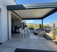 Terrace with a pergola at a 4-room apartment on Agátová Street in the Bratislava - Dúbravka area.