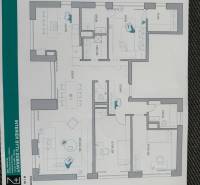 Floor plan of a 4-room apartment with a kitchen, living room, and bedrooms.