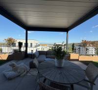 Terrace of a 4-room apartment on Agátová Street in Bratislava - Dúbravka with a view.
