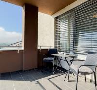 Balcony on Saratovska Street in Trenčín with a view; 3-room apartment, outdoor seating.