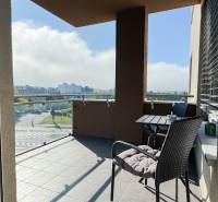 The balcony of a 3-room apartment on Saratovská Street in Trenčín with a view of the surroundings.