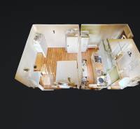 3D floor plan of a one-bedroom apartment with a wooden decor floor.