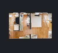 Floor plan of a 1-bedroom apartment with wood-patterned flooring and furnishings.