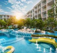 Apartment construction in Phuket with a swimming pool and green areas offers luxurious living.