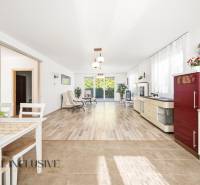 Interior of a family house with a bright living room and a wooden decor floor.