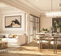 Living room of a three-room apartment with a wooden decor floor and an elegant dining area.