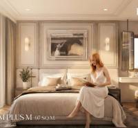 A bedroom in a 3-room apartment with a bed, a painting, and a woman reading a book.