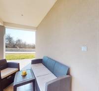 A family house in Horné Štitáre with a seating area on the terrace and a connection to the living room.
