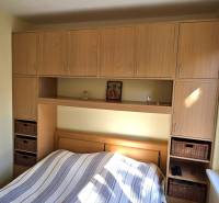 Bedroom with soft walls and storage space in a 3-room apartment.