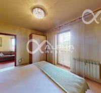 Bedroom with a built-in wardrobe and a window, 2-room apartment, cozy interior.