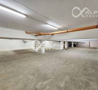 Parking spaces in an underground garage for a 2-room apartment.