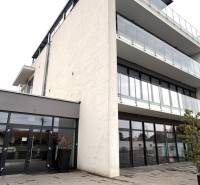 Building with glass balconies on Nové záhrady street in Bratislava - Ružinov, offices.