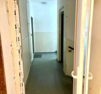 The corridor from the perspective of door reconstruction in the building Warehouses and Halls.