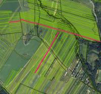 Aerial photograph of agricultural and forest land in Stránske with cadastral lines.
