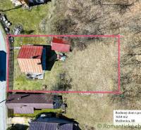 A cottage in Moštenica with a red roof surrounded by a plot of land measuring 1054 m².
