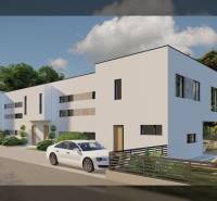 A family house in the city of Nin on Nin Street with a white facade and a modern car in front of it.