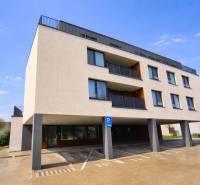 Exterior of the building with a parking lot on Na piesku street, Bratislava - Ružinov.