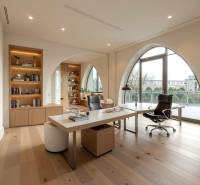 Commercial premises with shelves, modern furniture, and a wooden decor floor.