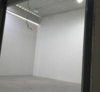 Empty room with white walls in the space of Warehouses and Halls.