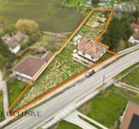 Aerial view of a family house in Michal na Ostrove with a large plot of land.