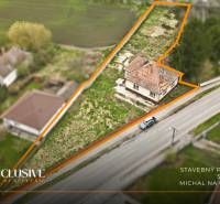 Aerial view of a construction site and a family house in Michal na Ostrove.