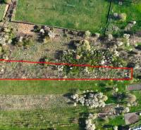 Gardens in Gemer with a cornice of flowers and grassy areas.