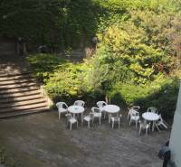 Terrace at the Offices on Konventná Street in Bratislava - Old Town with plastic seating.