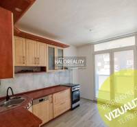 A kitchen with wooden decor and a kitchen unit in a 3-room apartment.
