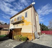 Family house in Tvrdošovce, Tvrdošovce Street, with a terrace and a paved courtyard.