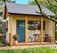 Gardens in Galanta with a gazebo surrounded by flowers and trees, ideal for relaxation.