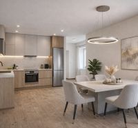 Kitchen with dining area in a family house, wooden decor flooring, elegant furnishings.