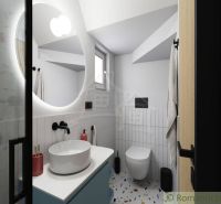 Bathroom in a cabin with a white sink and mirror, view of the toilet.