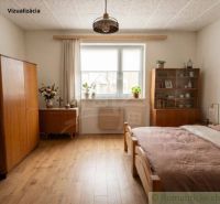 A bedroom in a family house with wooden decor on the floor, furniture, and decorations.