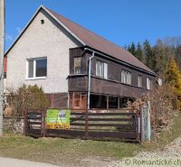Family house in Kalinovo with wooden elements and a garden, for sale.