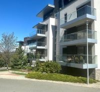 Apartment building Bratislava - Staré Mesto with balconies and glass railings.