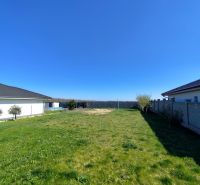 Land on Rekreačná Street in Biely Kostol with a landscaped green grassy area for living.