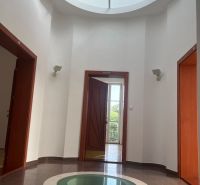 Round hallway with stained glass and doors on Štefánikova Street, suitable for offices.