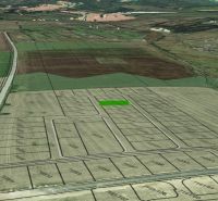 Aerial view of subdivided residential plots in the village of Mlynica.