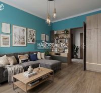 Living room in a 3-room apartment with a sofa, shelves, and a wooden decor floor.