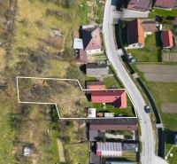 A family house on Dolná Poruba Street in Dolná Poruba with a large plot and an access road.