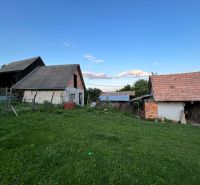 A family house in Kosihovce with a large garden and a rustic hayloft.