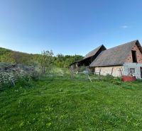 A family house in Kosihovce surrounded by greenery and rural landscape.